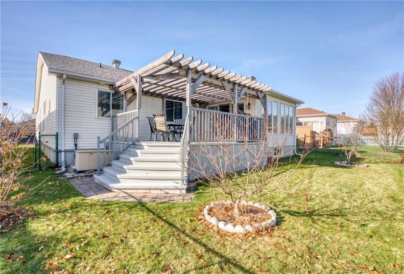 Stunning deck view w/convenient fenced backyard ...