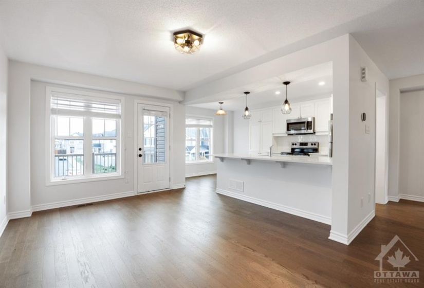 Living room space open to kitchen