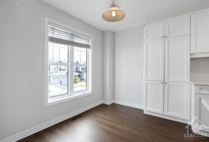 Pantry space and eating area in the kitchen