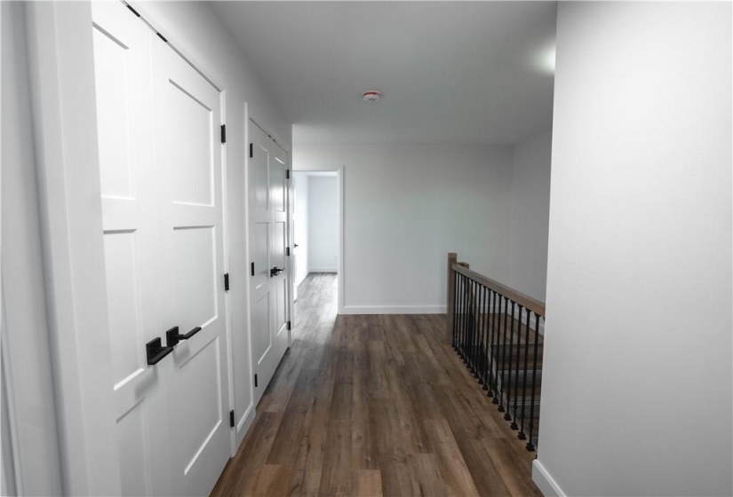 Upstairs Foyer with laundy room and linen closet