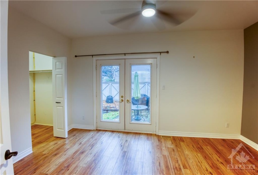 2nd Bedroom. with French doors to Yard